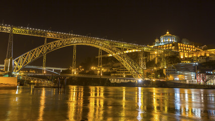 Fototapeta na wymiar Famous Dom Luis I Bridge at night time in Porto, Portugal.