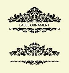 Label Ornament 1. Black floral ornament with blank space.