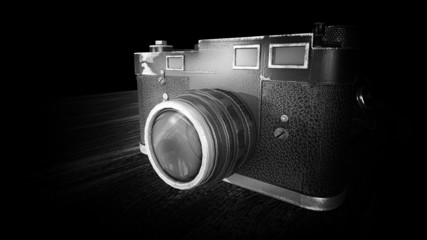 Old Vintage Photo Camera on Black Background