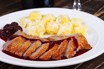 Duck breast fillet with blackberries and wine sauce
