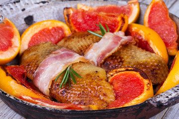 Roasted duck breast fillet with bacon and grapefruit