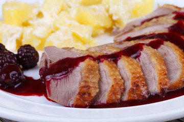 Duck breast fillet with blackberries and wine sauce