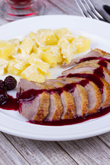 Duck breast fillet with blackberries and wine sauce