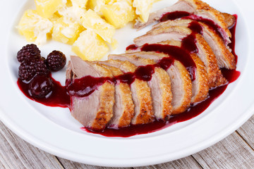 Duck breast fillet with blackberries and wine sauce