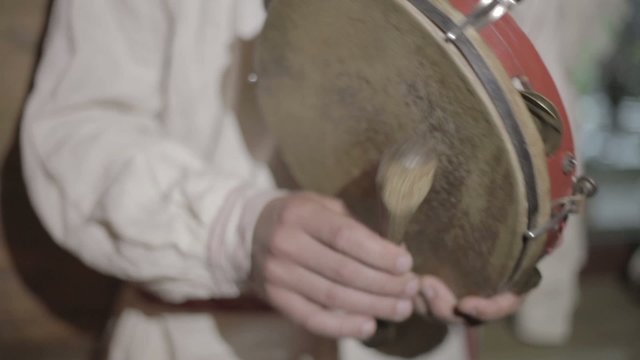Tambourine close-up, Male Hands Playing On Small Hand White Drum