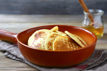 Delicious pancakes with honey