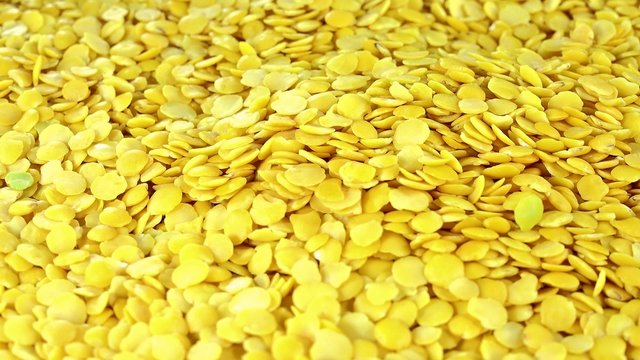 Portion of Yellow Lentils (seamless loopable 4K UHD footage)