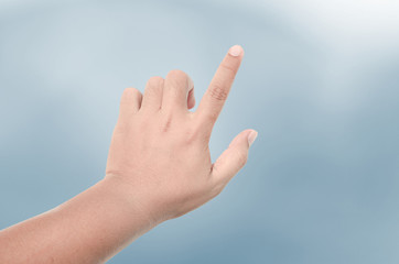 Hand touching virtual screen. Isolated on white