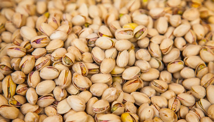 Pistachio nuts as a background for design