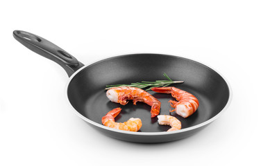 Raw shrimps on pan