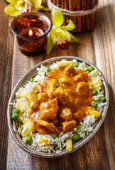 Chicken curry with basmati rice and green peas