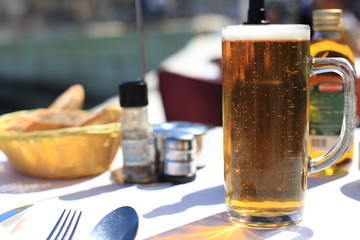 Mug of beer in a cafe