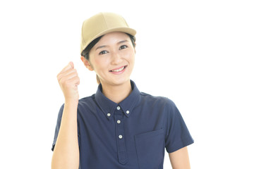 ガッツポーズの女性労働者