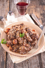 meat cooked wine sauce