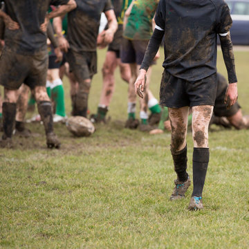 Rugby, muddy game of rugby, square cropped image