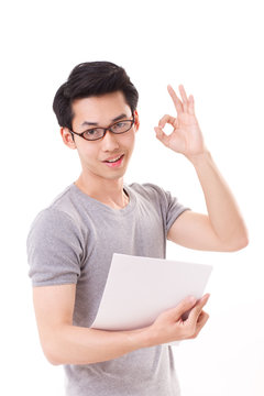 smart, happy, smiling nerd or geek man showing ok hand sign gest