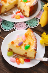 cheesecake with raisins for easter on wooden table