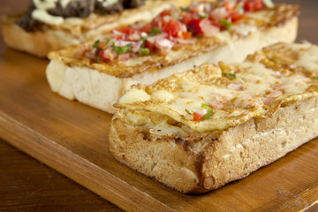 Toasted open faced omelette egg sandwich with melted mozzarella