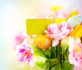 Easter holiday flowers bunch with greeting card. Colorful tulips