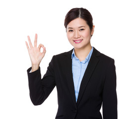 Asian businesswoman with ok sign