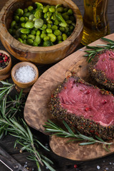 Beef steak fillet with pepper on rustic table