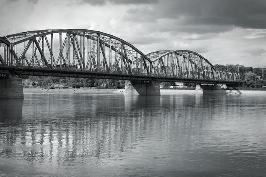 Fototapeta Torun bridge over Wisla river in Poland. Black and white.