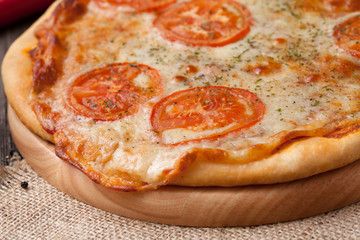 Pizza margherita on vintage textile