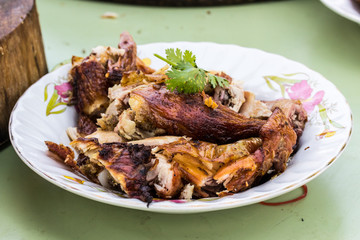 grilled chicken on white disk