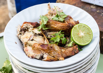 grilled chicken on white disk