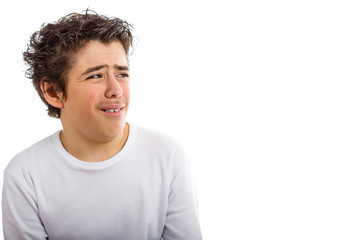 Fototapeta premium Hispanic boy looks worried to the right side