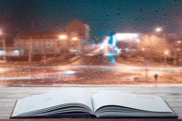 Reading a book on a rainy evening