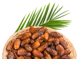 Date fruits in a dish, top view