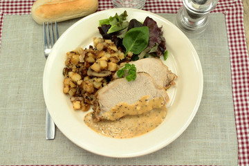 rôti de porc et pommes de terre