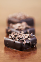 Three chocolates with nuts