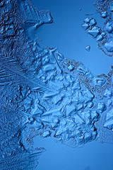 abstract blue background cold ice texture with cracks