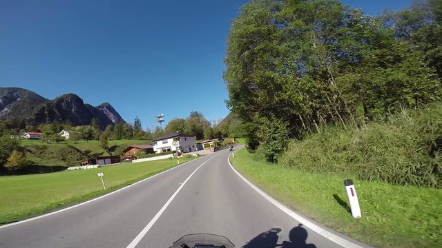 Steep turns on a motorbike riding through the countryside point