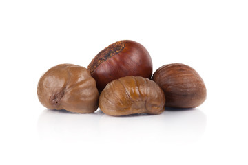 chestnuts sit on a white background