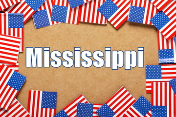 Fototapeta na wymiar The title Mississippi with a border of USA flags