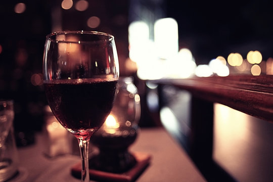 glass of wine restaurant interior serving dinner