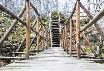 Fototapeta na wymiar Wooden bridge mountain