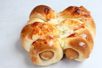 Cheese sausage bread  on white background.