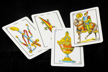 Spanish cards in black background