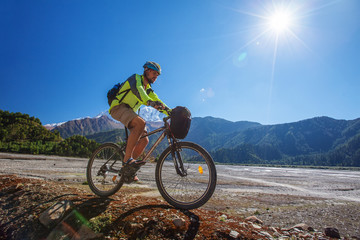 Fototapeta premium Biker-boy in Himalaya mountains, Anapurna region