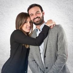 Cute couple over white background.