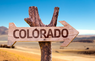 Colorado wooden sign with a desert background