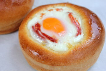 bun stuffed with the baked egg.