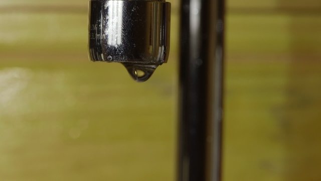 Tap water running from faucet
