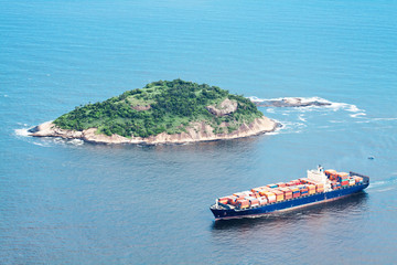 freighter is next to island © Mik Man