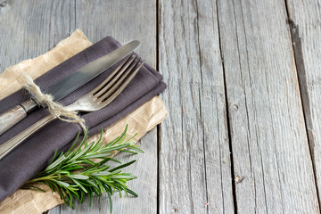 Vintage Table setting with rosemary decor