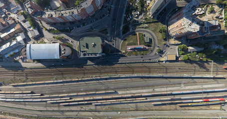 Aerial city view with crossroads buildings and parks